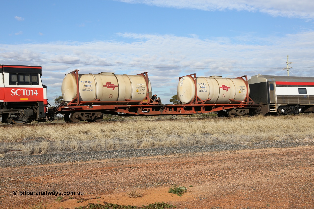 130710 1007
Parkeston, SCT train 3PG1 fuel pod waggon PQFY 3055 with two AMT5 type SCT-Logicoil 32,000 litre fuel tanktainers TILU 102029 and TILU 102024. PQFY 3055 was built by Carmor Engineering SA in 1976 as an RMX flat waggon, recoded to AQMY, then reclassed to RQMY in 1994.
Keywords: PQFY-type;PQFY3055;Carmor-Engineering-SA;RMX-type;AQMY-type;RQMY-type;