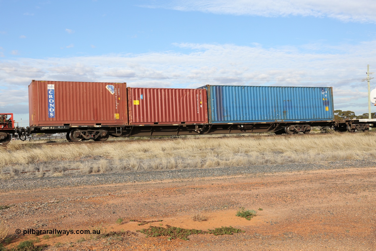 130710 1023
Parkeston, SCT train 3PG1, 80' jumbo container waggon PQDY 6 was originally built by Victorian Railways Newport Workshops in August 1975 as one of twenty five FCF type 'Jumbo' container waggons, recoded to FCW in 04/1977, recoded to VQDW in 01/1980 then to National Rail in April 1994 as RQDW, then RQDY. Ended up with Freight Australia, and now as PQDY 6 with SCT. Carrying two 20' containers, a Cronos 2EG1 type CRXU 076834, a 22G1 type BSIU 237290 and a 40' SCF 45G1 type container SCF 996860.
Keywords: PQDY-type;PQDY6;Victorian-Railways-Newport-WS;FCF-type;FCW-type;VQDW-type;