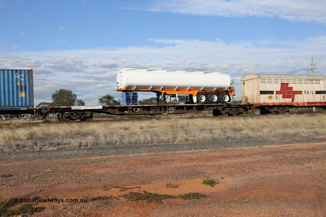 130710 1024
Parkeston, SCT train 3PG1, PQMY type 60' flat waggon PQMY 3058, originally built by Carmor Engineering SA as an RMX type in a batch of fifty in 1975. Recoded to AQMY, then to RQMY in April 1994. Loaded with a semi trailer water cart tank.
Keywords: PQMY-type;PQMY3058;Carmor-Engineering-SA;RMX-type;AQMX-type;AQMY-type;RQMY-type;