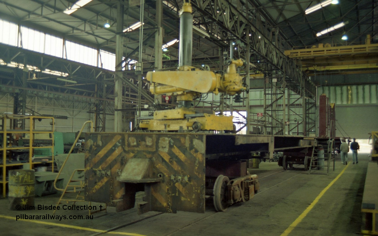 22657
Bassendean, during an Open Day at the Goninan workshops, a stripped back ALCo locomotive frame under re-construction which will become a GE CM40-8M. 20th July 1991.
Jim Bisdee photo.
