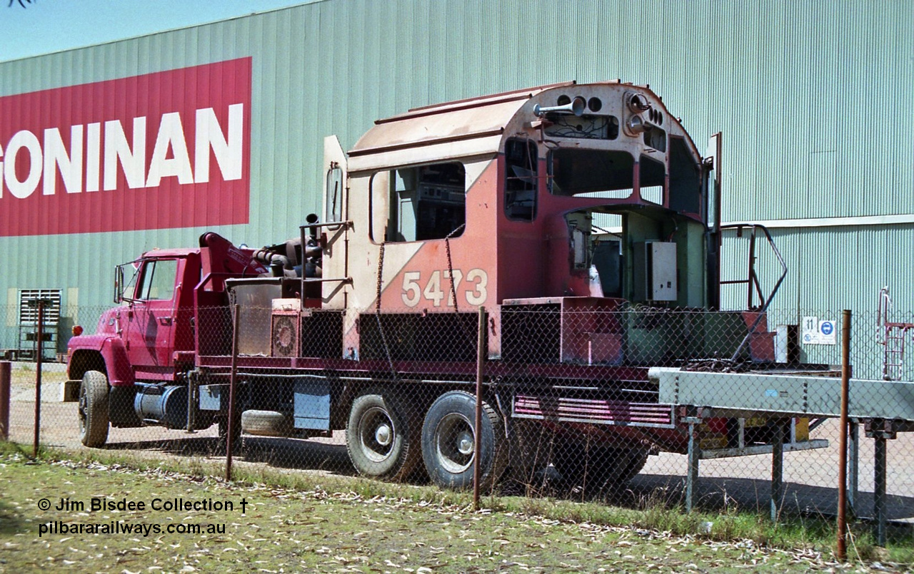 23714
Bassendean, Goninan workshops, Mt Newman Mining's AE Goodwin built ALCo model M636 unit 5473 serial G6047-5 being scrapped to frame level, cab section on truck. December 1992.
Jim Bisdee photo.
Keywords: 5473;AE-Goodwin;ALCo;M636C;G6047-5;