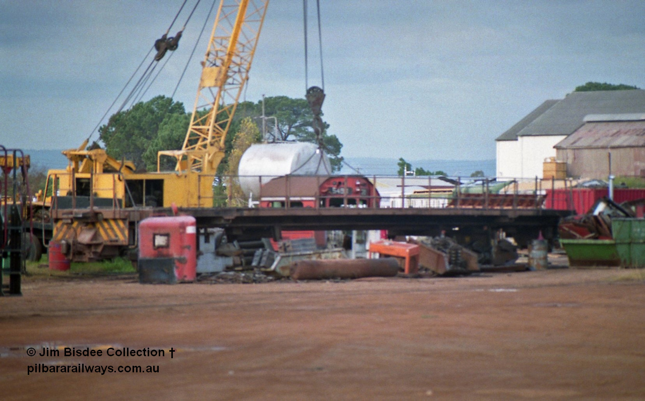 23879
Bassendean, Goninan workshops, a stripped back ALCo locomotive frame under re-construction which will become a GE CM40-8M. July 1993.
Jim Bisdee photo.
Keywords: Goninan;GE;CM40-8M;