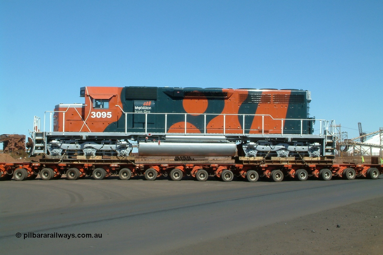 040807 112646r
Port Hedland, Gilbert Street, BHP Billiton EMD SD40R unit 3095 serial 33677 originally Southern Pacific SD40 SP 8485 being road delivered by Kingston Heavy Haulage on a 168 wheel float as it turns into Gate 9 for Nelson Point 7th August 2004.
Keywords: 3095;EMD;SD40R;33677/7083-7;SD40;SP8485;
