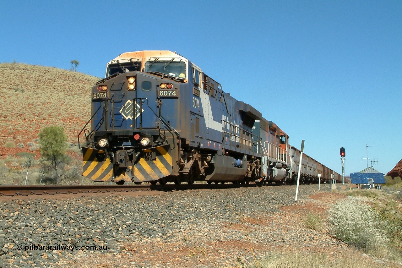 040810 130942r
The 226 km between Hesta and Shaw sidings, BHP GE AC6000 6074 'Kalgan' serial 51066 leading EMD SD40R 3088 serial 31513 originally Southern Pacific SD40 SP 8432 with a loaded train powering upgrade 10th August 2004.
Keywords: 6074;GE;AC6000;51066;