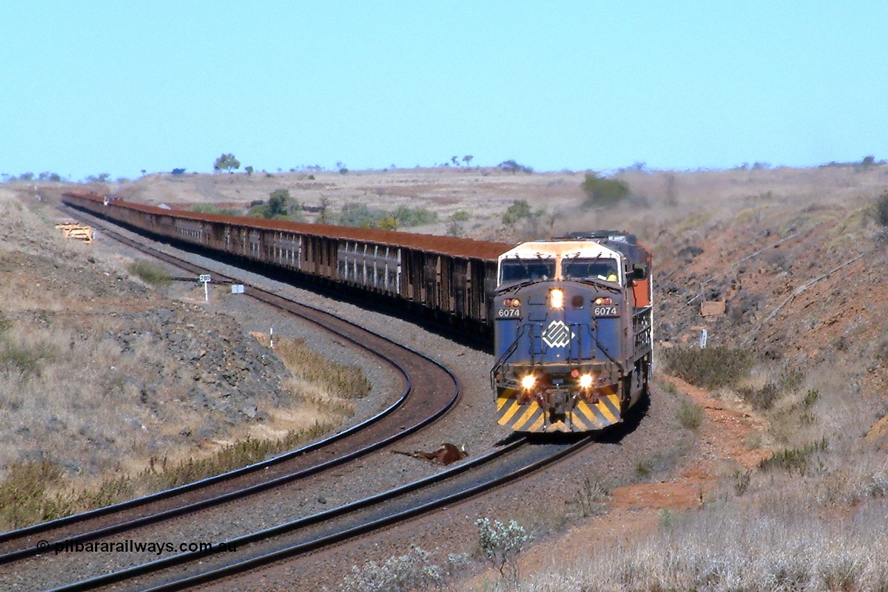 040810 133232r
Shaw Siding, BHP GE AC6000 6074 'Kalgan' serial 51066 leading EMD SD40R 3088 serial 31513 originally Southern Pacific SD40 SP 8432 with a loaded pass a victim of the cow plough 10th August 2004.
Keywords: 6074;GE;AC6000;51066;