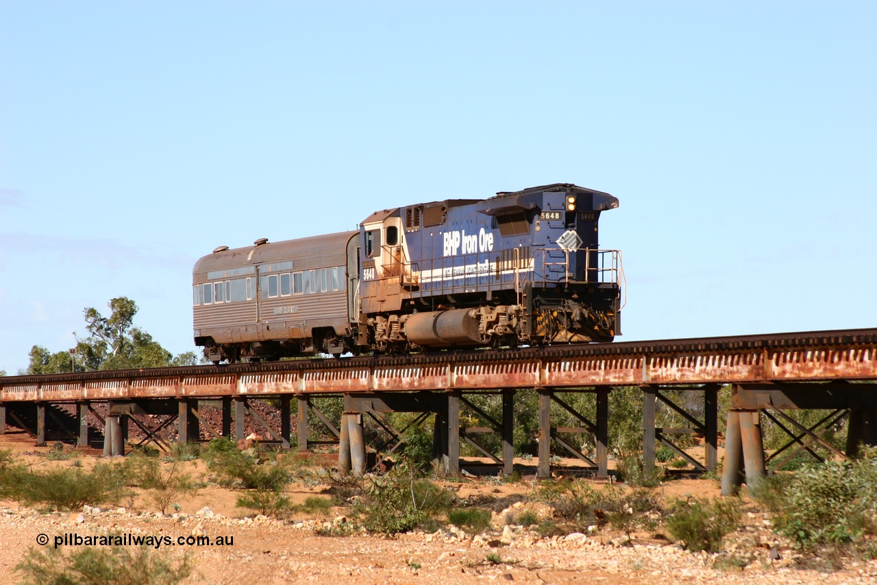 050625 3788
Tabba Tabba Creek bridge at the 48 km on the GML sees BHP Goninan GE rebuilt model CM40-8M unit 5648 'Kwangyang Bay' serial 8412-06 / 93-139 long end leading the Sundowner on its return to Hedland 25th June 2005.
Keywords: 5648;Goninan;GE;CM40-8M;8412-06/93-139;rebuild;AE-Goodwin;ALCo;M636C;5477;G6047-9;