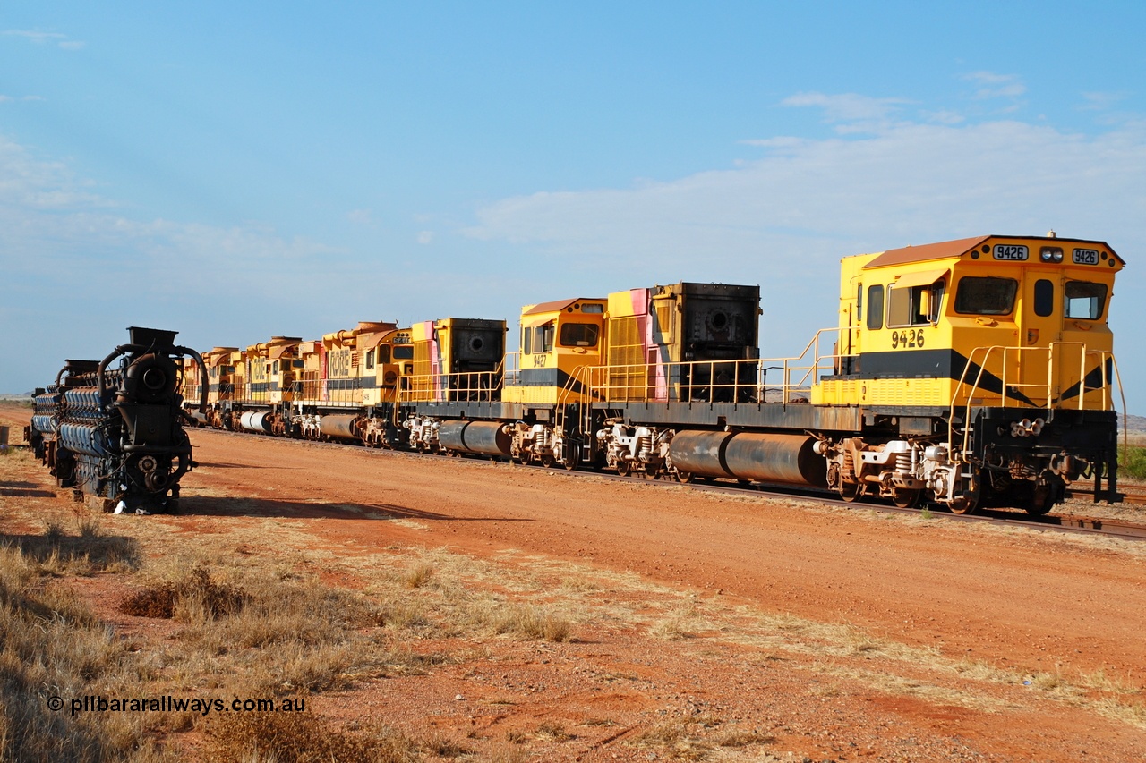 061026 0359r
Seven Mile, retired Robe River ALCo units in preparation to travel to Perth. Comeng WA ALCo rebuild C636R 9426 serial WA143-1 leads the all ALCo line up. 26th October 2006.
Geoffrey Higham image.
Keywords: 9426;Comeng-WA;C636R;WA143-1;rebuild;ALCo;Schenectady-NY;C636;Conrail;6782;3499-3;