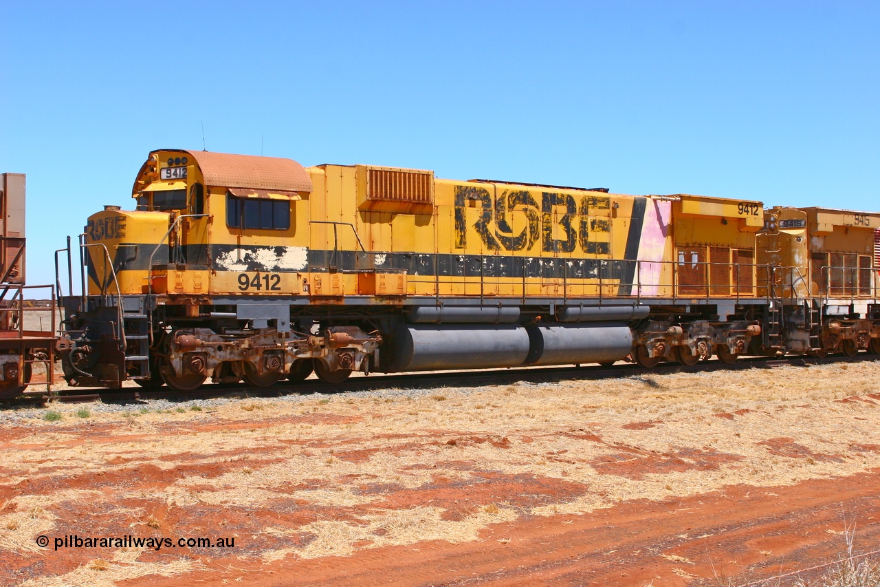 061209 8249r
Seven Mile 38 Road, former Robe River AE Goodwin built ALCo M636 unit 9412 serial G6060-3 from December 1971, originally numbered 262.003 during construction, then 1712 and finally 9412 awaits a new owner. 9th of December 2006.
Keywords: 9412;AE-Goodwin;MLW-ALCo;M636;G6060-3;