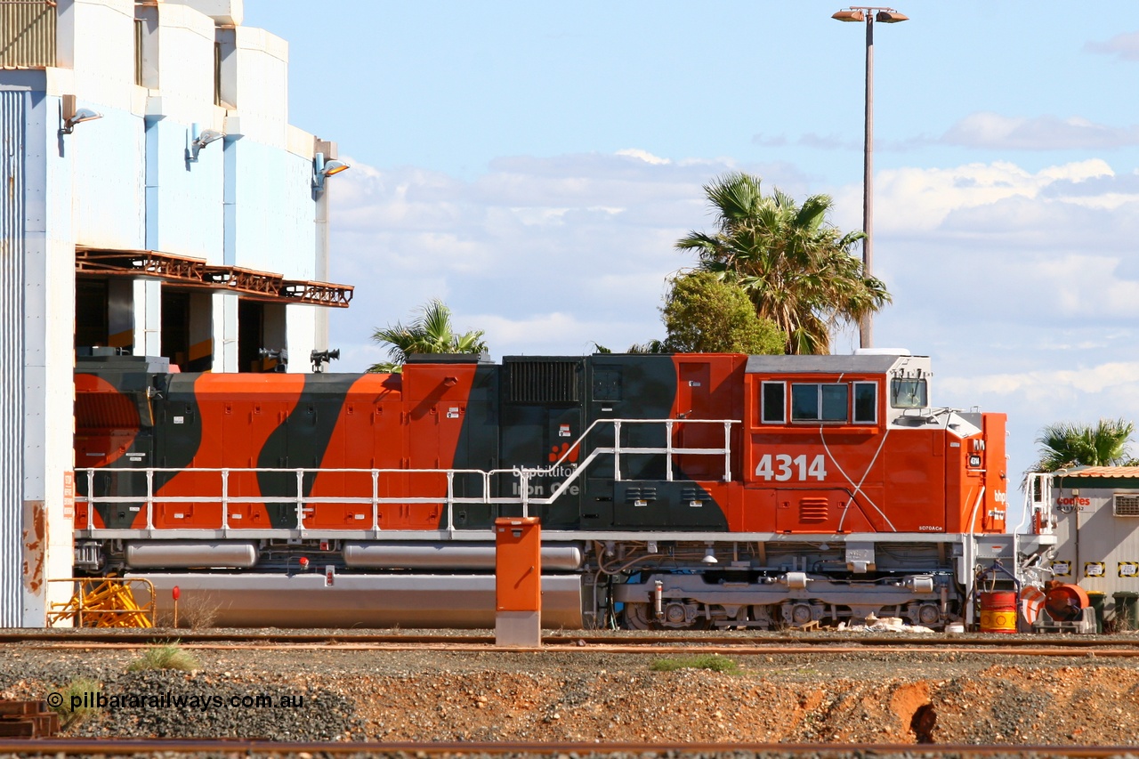 070402 8697
Nelson Point Locomotive Service Shop see brand new BHP Billiton's Electro-Motive built SD70ACe/LC unit 4314 serial 20058712-001, this first of a batch of ten to have the Electro-Motive 'Whisper' or isolated cab. BHP Billiton bought the first SD70ACe type locomotive with this feature, and as such this loco was sent for testing to the Pueblo Test Track in the USA prior to delivery. EDI personnel are fitting the unit out since arriving only the day before. 2nd April 2007.
Keywords: 4314;Electro-Motive;EMD;SD70ACe/LC;20058712-001;