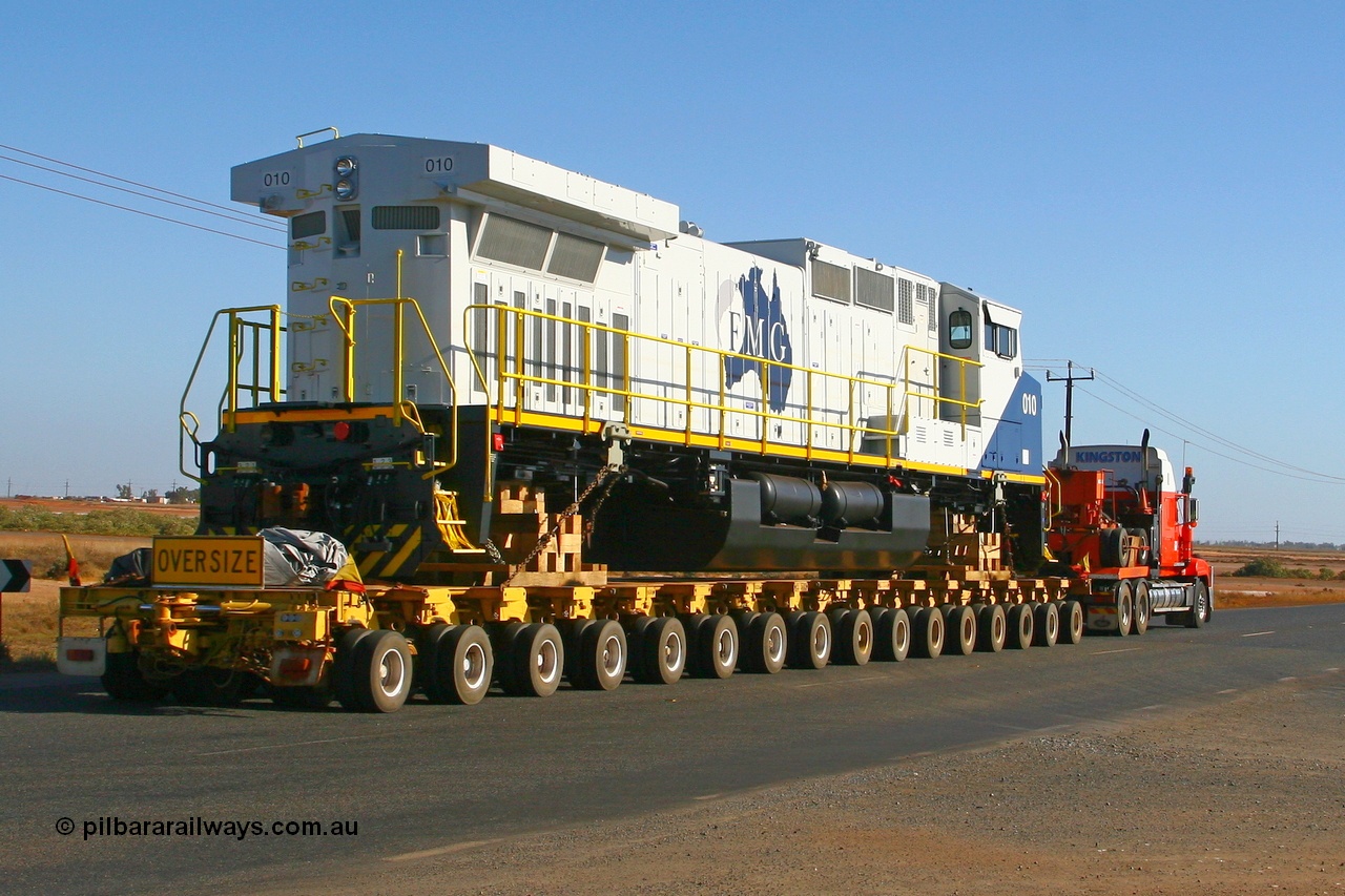 071101 1135r
Redbank Bridge, this view shows just how close an FMG General Electric built Dash 9-44CW 010 serial 58187 is to sister units of Pilbara Rail Dash 9-44CW in the way of cooling vents etc. Thursday 1st November 2007.
Keywords: FMG-010;GE;Dash-9-44CW;58187;