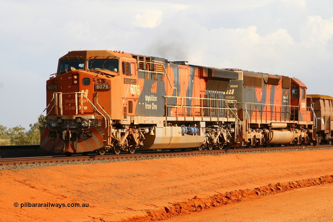 080124 1684r
Bing Siding, BHP Billiton GE AC6000 locomotive 6076 'Mt Goldsworthy' serial 51068 leads a loaded train with an SD40R in trail 24th January 2008. 6076 was the first AC6000 to be repainted in the 'earth' livery back in September 2003 and slight differences can be noticed between this units' livery and that applied to 6070 and 6075.
Keywords: 6076;GE;AC6000;51068;