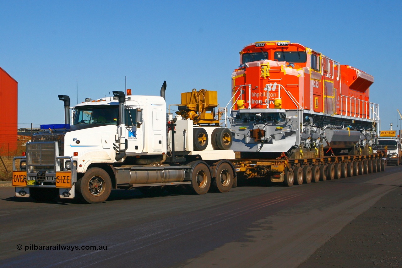 080614 2611
Port Hedland, Gilbert Street, brand new BHP Billiton Electro-Motive built SD70ACe 'Pumpkin' 4333 serial 20066862-062 is turning into Gate 9 and is the final unit in a ten unit order that was built originally for BNSF prior to BHP purchasing them. Thus proving an off the self US unit is suitable for Australia. Saturday 14th June 2008.
Keywords: 4333;Electro-Motive-London-Ontario;EMD;SD70ACe;20066862-062;BNSF-9191;