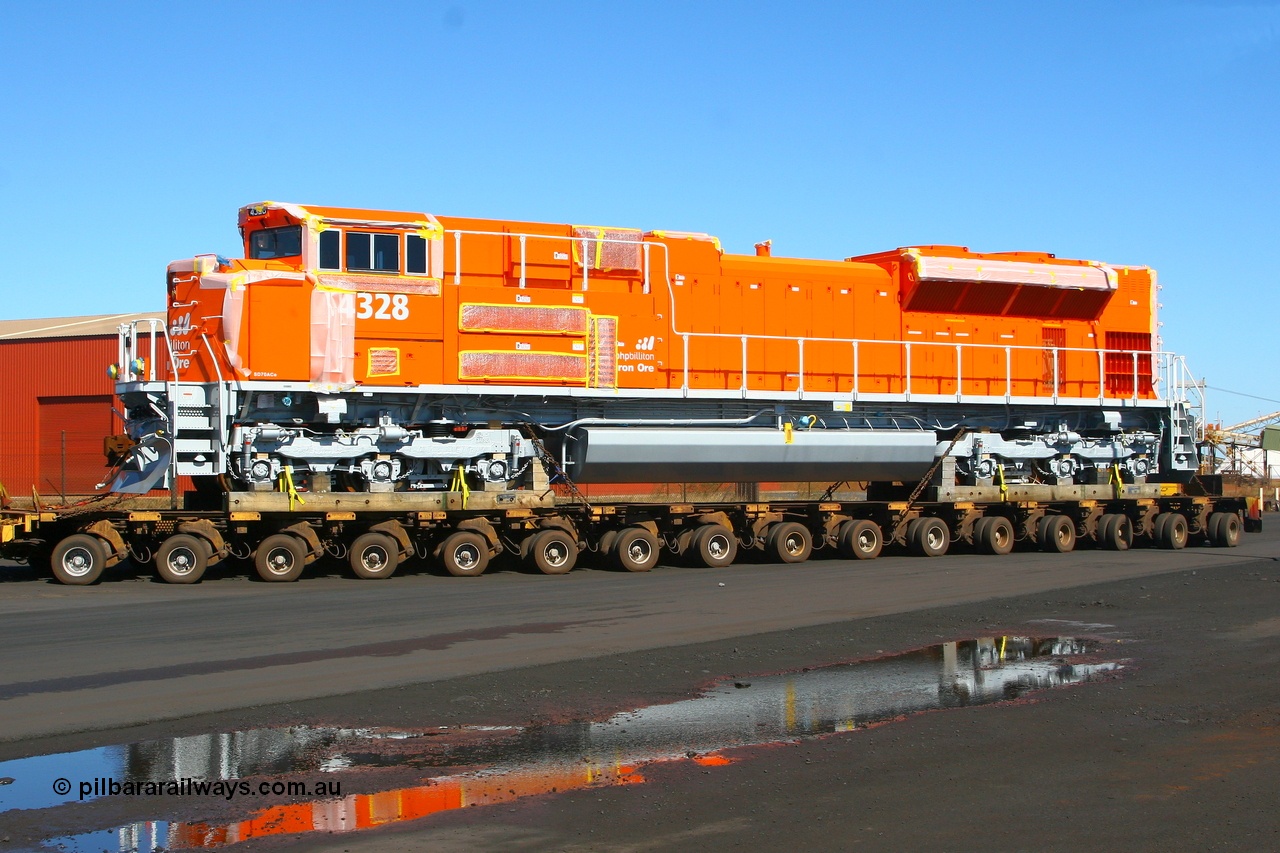 080614 2629
Port Hedland, Gilbert Street, the last BHP Billiton Electro-Motive built SD70ACe 'Pumpkin' 4328 serial 20066862-057 and originally destined to be BNSF 9186 is turning into Gate 9 after being unloaded off the heavy lift ship DA QIANG Saturday 14th June 2008.
Keywords: 4328;Electro-Motive-London-Ontario;EMD;SD70ACe;20066862-057;BNSF-9186;