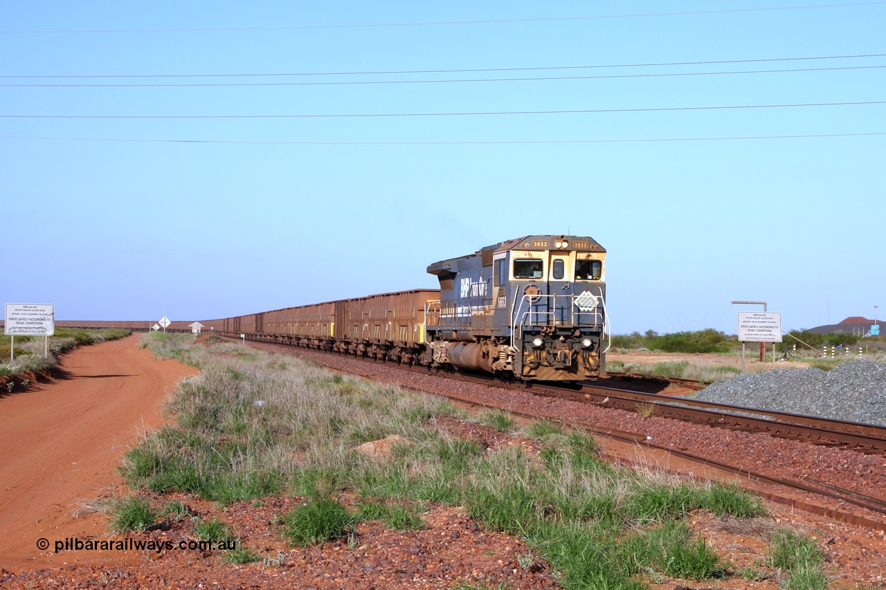 090112 0725r
Goldsworthy Junction, 19.3 km grade crossing on the GML sees BHP Goninan GE rebuild CM40-8M locomotive 5653 'Chiba' serial 8412-10 / 93-144 with an empty Yarrie train 12th January 2009.
Keywords: 5653;Goninan;GE;CM40-8M;8412-10/93-144;rebuild;AE-Goodwin;ALCo;M636C;5484;G6061-5;
