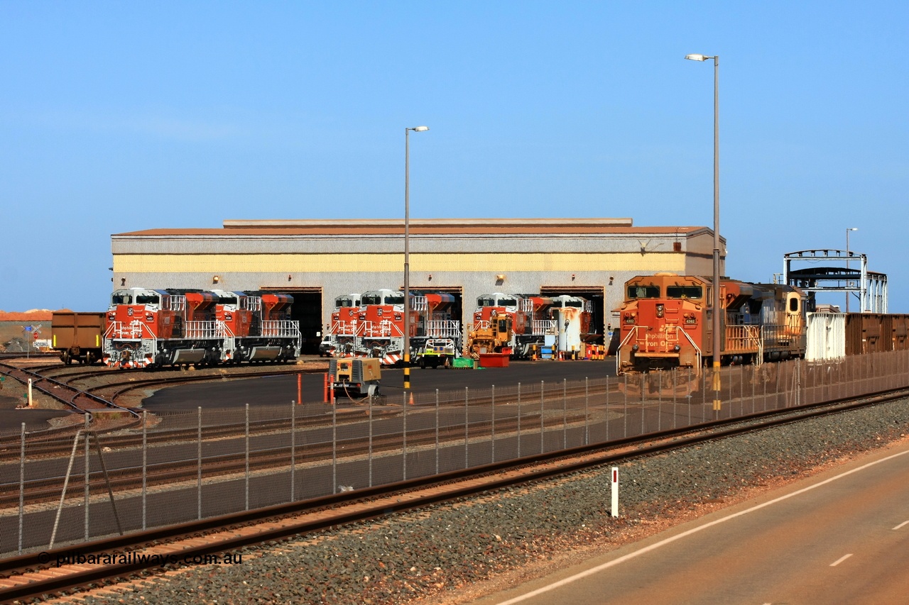 090121 0986r
Boodarie Workshop BHP Billiton EMD built SD70ACe/LC (first order) 4302 'Mooka' serial 20038540-002 and built by Electro-Motive in London Ontario watches on with Goninan GE rebuild CM40-8M 5656 as units from the forth order of SD70ACe/LC units get commissioned by EDI personal. Units in view are (L to R) 4337, 4338, 4335, 4340, 4346 and 4339 21st January 2009.
Keywords: 4302;Electro-Motive-London-Ontario;EMD;20038540-003;