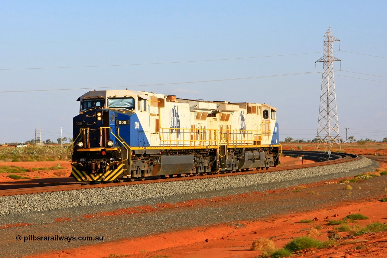 090912 2249r
Boodarie, at the 5 km curve between the Great Northern Highway and the car dumper balloon FMG General Electric built Dash 9-44CW light engines 009 serial 58186 and class leader 001 serial 58178 return to the port under Proceed Authority 56 following refuelling at Rowley Yard. 12th September 2009.
Keywords: FMG-009;GE;Dash-9-44CW;58186;