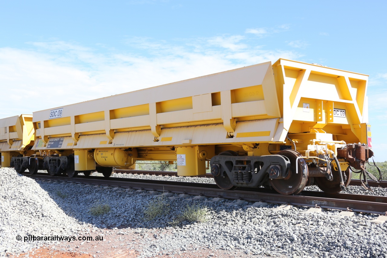 130815 2574
Barker Siding, FMG has ten 82.4 tonne capacity air operated side dump waggons built in USA by JK-CO in 2012. SDC 09 sits at the ballast loading point. 15th August 2013.
Keywords: SDC09;JK-CO-USA;FMG-ballast-waggon;