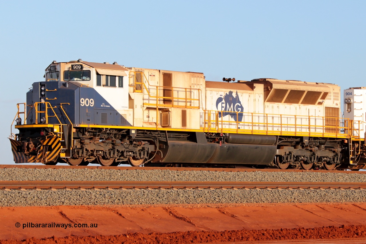 131126 3779r
Kanyirri Yard, FMG's Electro-Motive Division built SD9043MAC locomotive 909 serial 976833-33 was originally UP SD90MAC-H 8554 built in 1999, rebuilt by NS Juniata Shops in 2011 for FMG and fitted with a 710G3 engine. 26th November 2013.
Keywords: FMG-909;NS-Juniata-Shops-USA;EMD;SD9043MAC;976833-33;