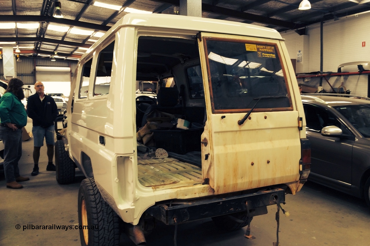 140603 0699r
Here's the Troopy at the panel shop with a complete new LHS panel viewed from the back, I'm talking to Keith from the panel shop. June 2014.
