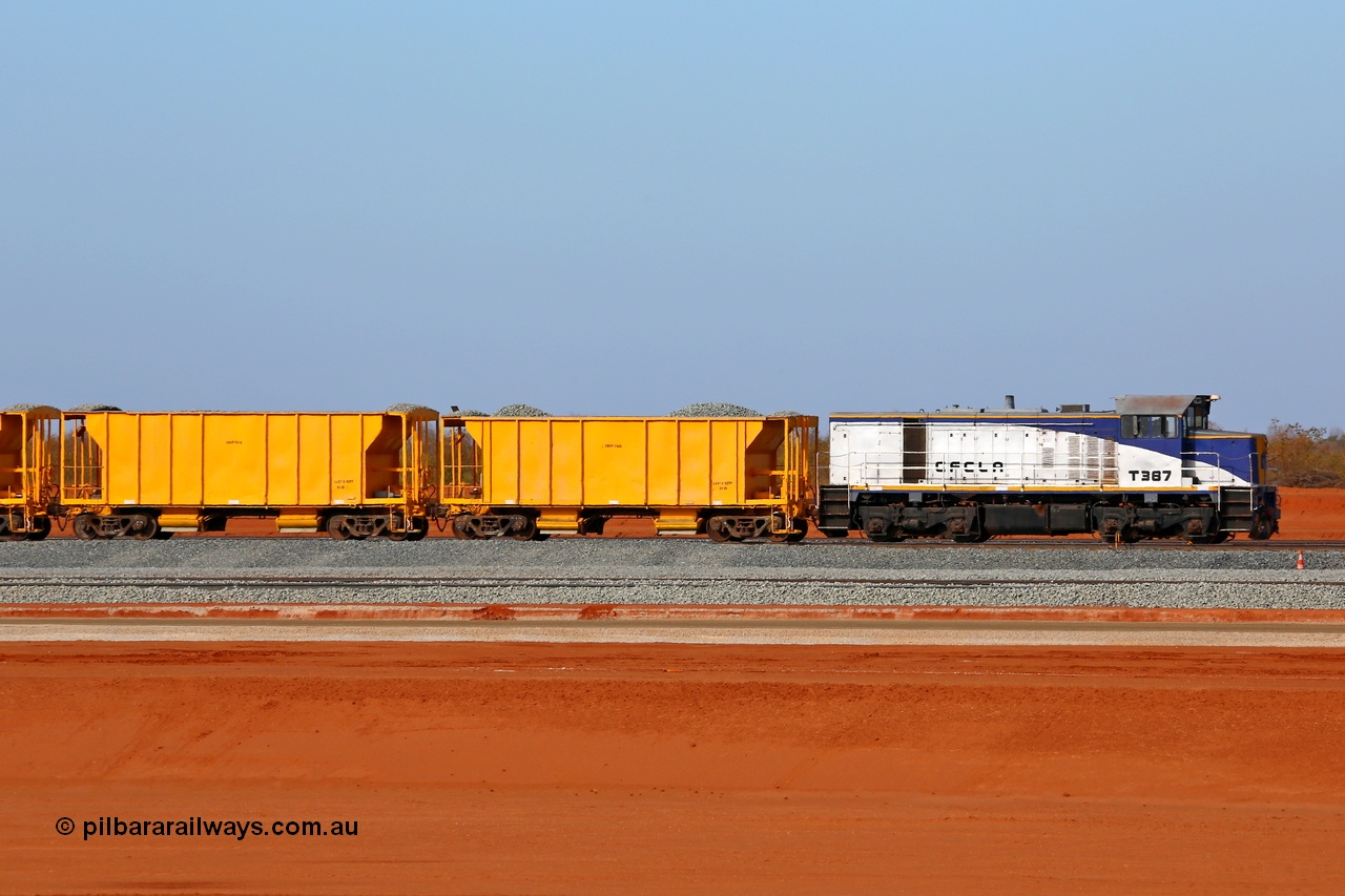 150412 7910
Boodarie, Roy Hill Tad Yard under construction with an ex-Victorian Railways T class in the Pilbara, who would've thought?! Now owned by CFCLA T class T 387 a Clyde Engineering EMD model G8B serial 65-417 with CFCLA ballast cars. 12th April 2015. [url=https://goo.gl/maps/bV8Ox]View map here[/url].
Keywords: T-class;T387;Clyde-Engineering-Granville-NSW;EMD;G8B;65-417;