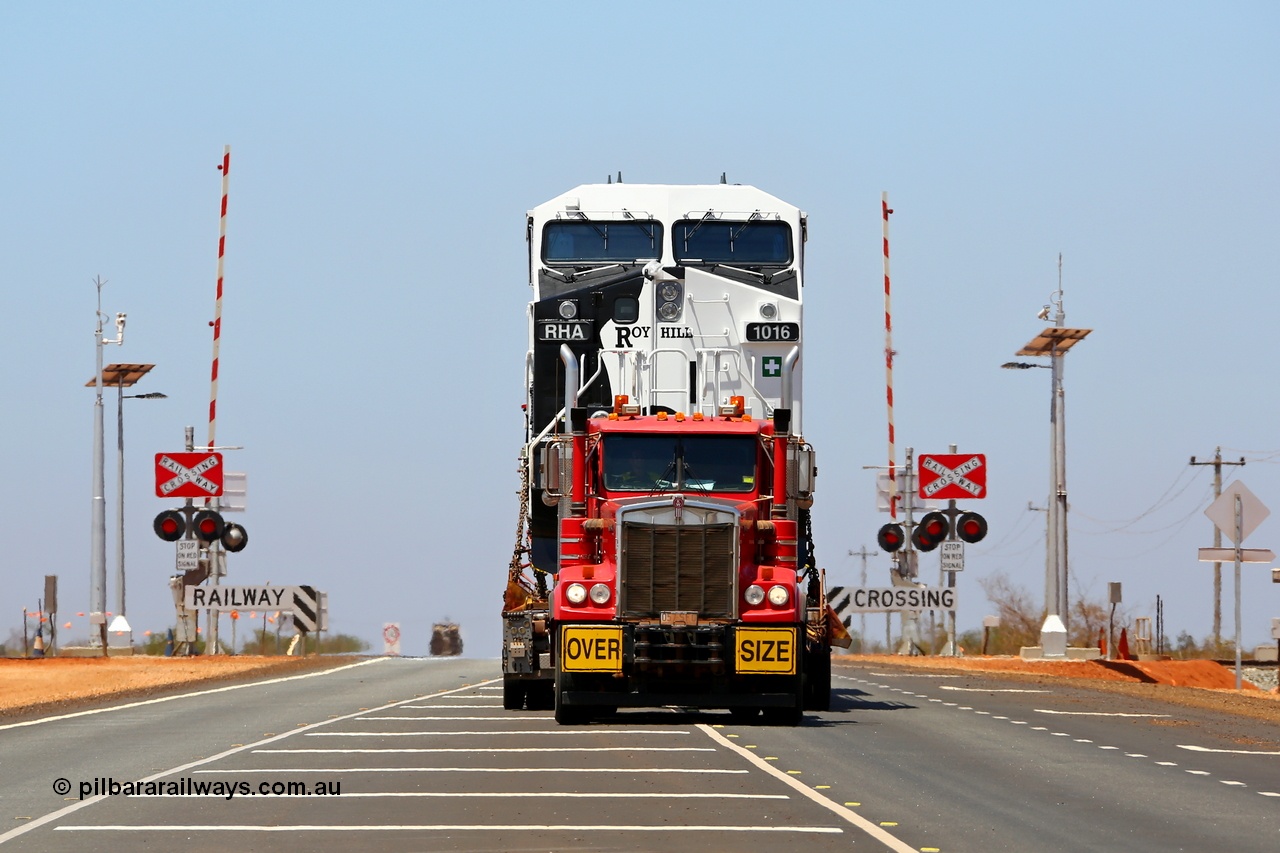 151231 9740r
Great Northern Highway 18.2 km grade crossing, Roy Hill's General Electric built ES44ACi loco RHA 1016 serial 63827 being delivered by ALE as it crosses the Roy Hill railways grade crossing. 31st December 2015. [url=https://goo.gl/maps/Do46dZmcqvC2]View map here[/url].
Keywords: RHA-class;RHA1016;GE;ES44ACi;63827;