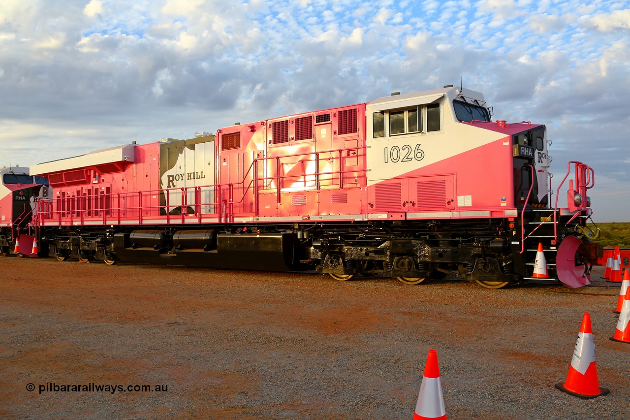 180918 0227r
Boodarie, about the 23 km at Roy Hill Rail Construction Yard, brand new Roy Hill RHA class loco RHA 1026 with serial 64743 a GE Fort Worth built GE model ES44ACi in the special Breast Cancer Awareness livery undergoes commissioning prior to official handover. All five were built at General Electric's Fort Worth Texas plant. 18th September 2018. 
[url=https://goo.gl/maps/57fPumfasGv]GeoData[/url].
Keywords: RHA-class;RHA1026;GE-Fort-Worth;GE;ES44ACi;64743;