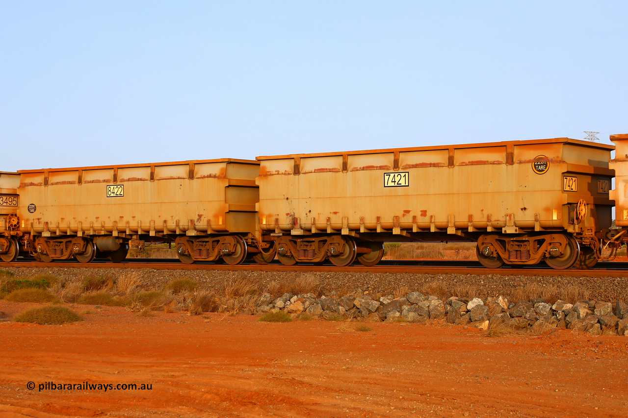 07421-08422 220118 3461
FMG 7421 and 8422 on an empty train at Boodarie, January 18, 2022. Forty four waggons numbered 7421 slave and 8422 control, up to 7443 slave and 8444 control built by CRRC Yangtze in 2017 with the ribbed body style.
Keywords: 7421-8422;CRRC-Yangtze;FMG-ore-waggon;