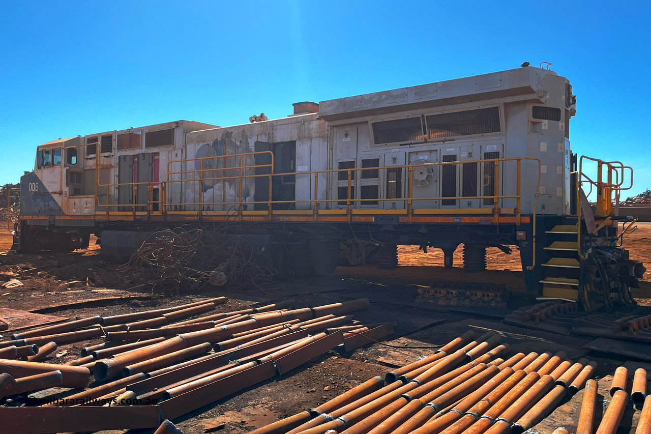250430 07417
Wedgefield, FMG General Electric built Dash 9-44CW locomotive 006 with serial number 58183, built in August 2007 and delivered to FMG in November that year. Stripped on bogies, radiators, alternator and other items seen here at Sell & Parker, Wedgefield, WA for scrapping. April 30, 2025.
Keywords: FMG-006;GE;Dash-9-44CW;58183